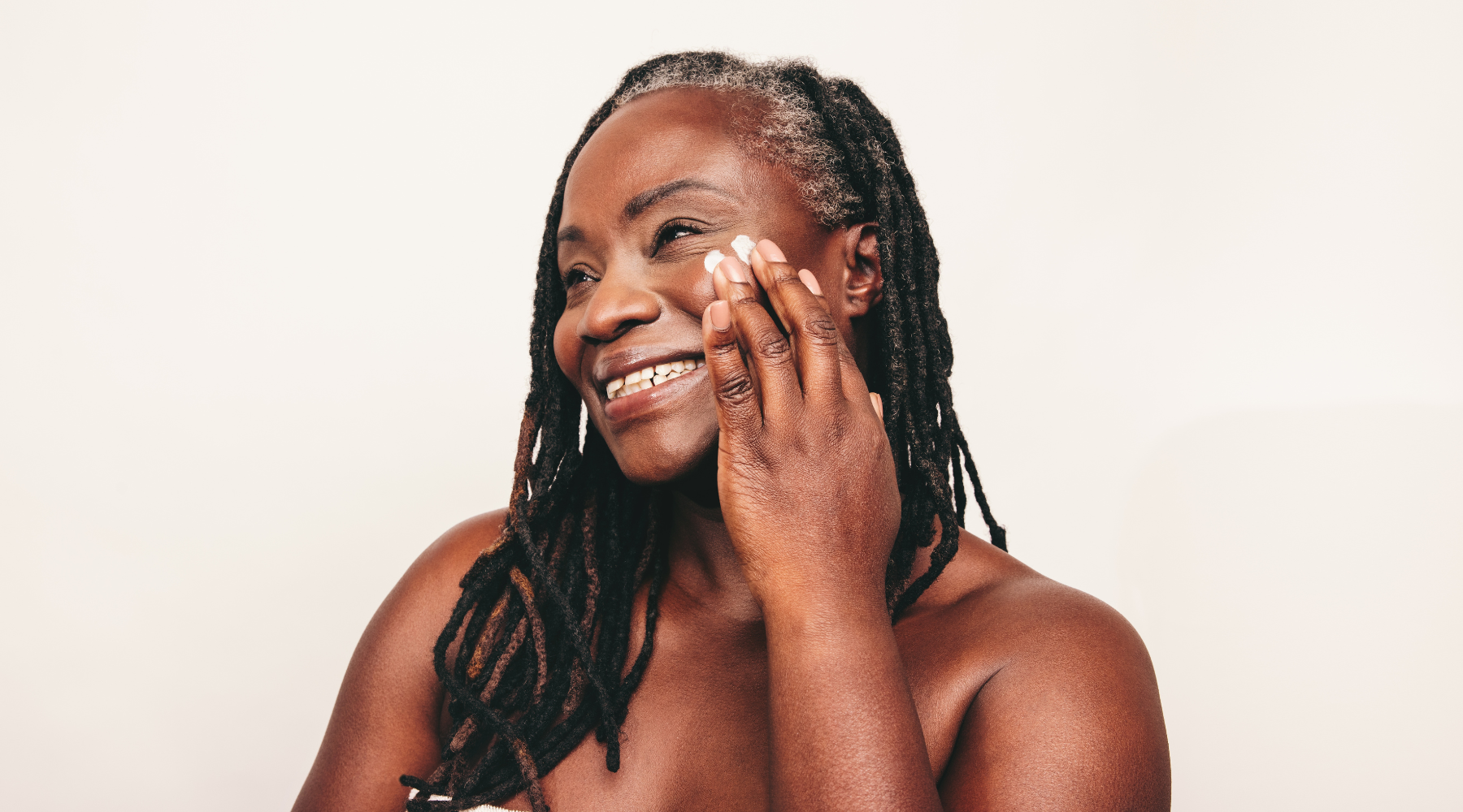 Mature woman with healthy skin | Oxford Healthspan